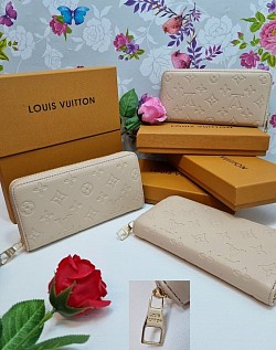 CREAM LV PURSE £25