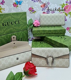 CREAM GUCCI PURSE £25