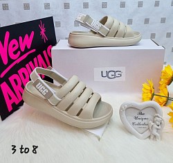 CREAM UGG SLIDERS £30