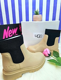 CREAM UGG BOOTS £35