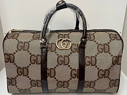 BROWN GUCCI TRAVEL BAG £35