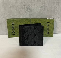 GUCCI WALLET £25