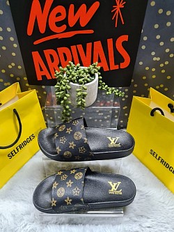 BLACK LOUIS VUITTON SLIDERS £30