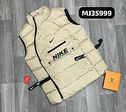 CREAM NIKE BODYWARMER £40