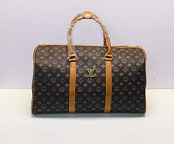 BROWN LV TRAVEL BAG £35